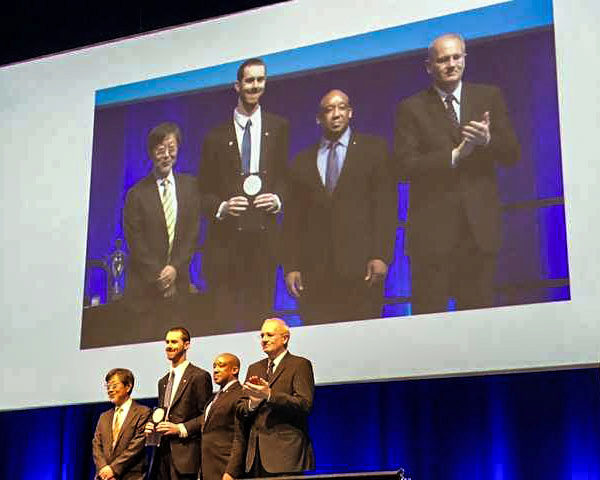 Schulte and members of the IAC after Schulte received the award