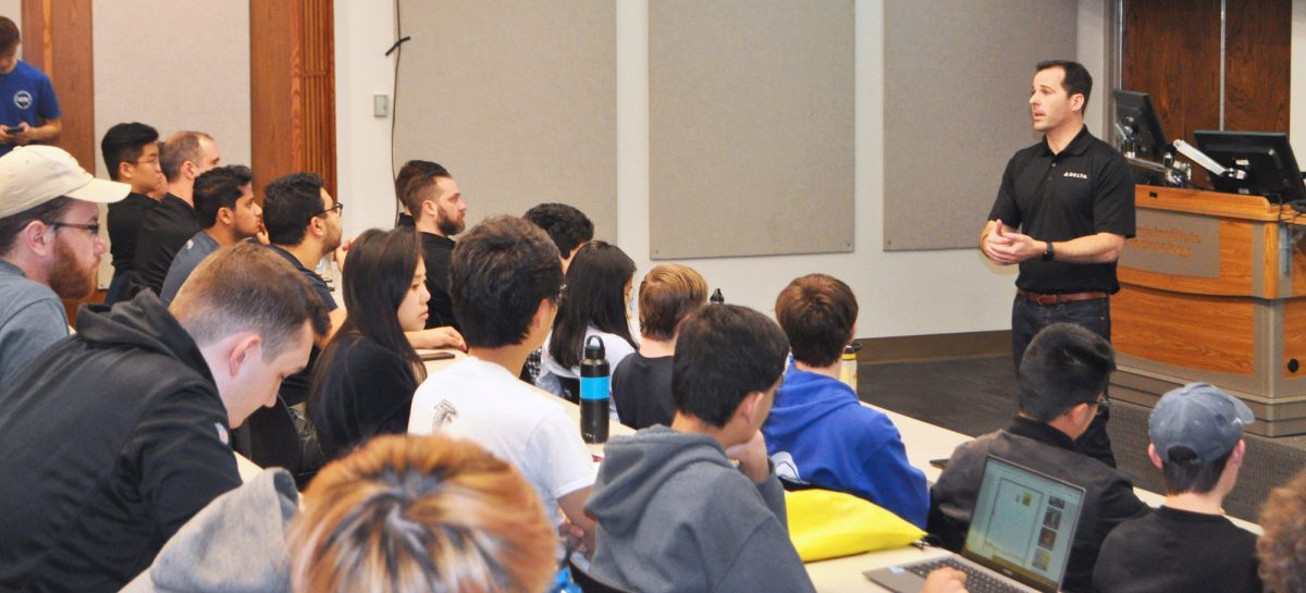 Delta's Brad Sheehan welcome students to the 31 hour hackathon