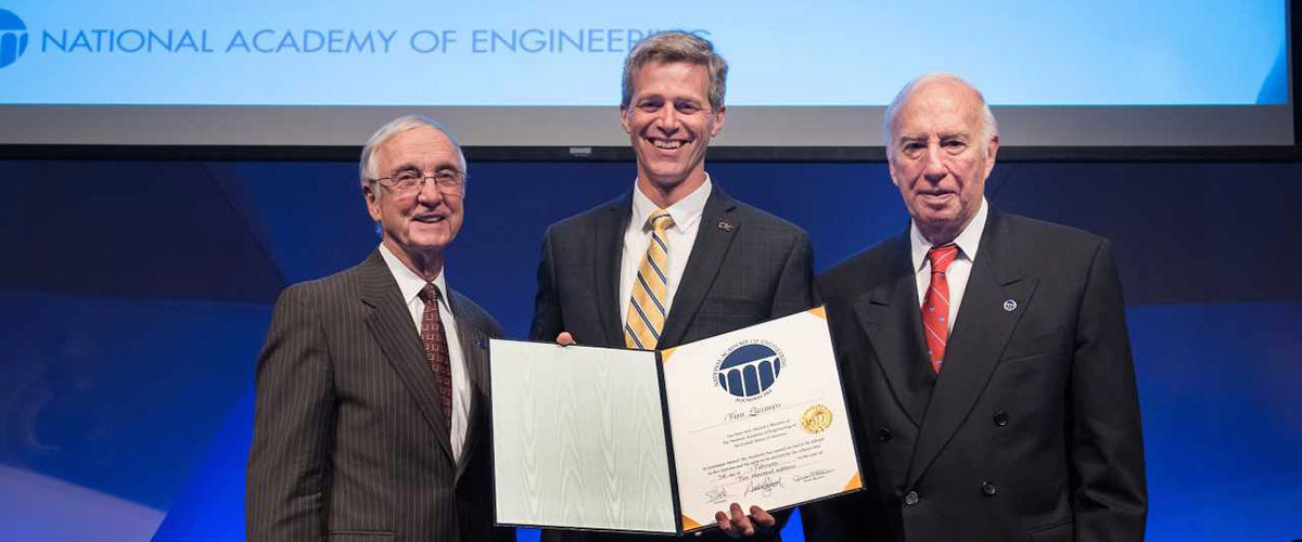 Two members of the National Academy of Engineering flanking Prof. Tim Lieuwen at his NAE induction ceremony