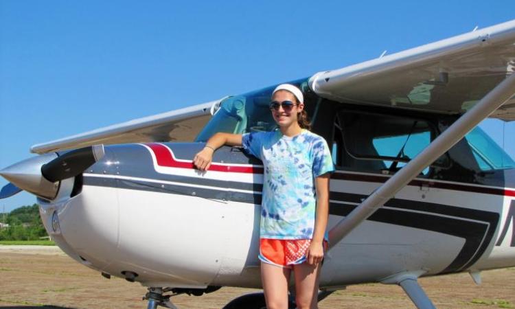 <p>This photo was snapped after Gross took her first solo  flight (no instructor!) The plane is a Cessna 150.</p>