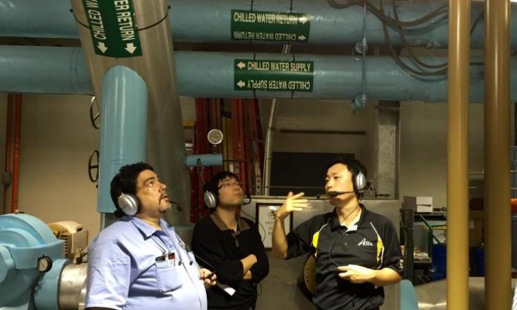 <p><em>Wesley Harding, stationary engineer in Facilities; Linyu Zhang, a graduate student with the ASDL; and Jung-Ho Lewe, research engineer in the ASDL, tour the Holland Heating and Cooling Plant, located in the center of campus.</em></p>