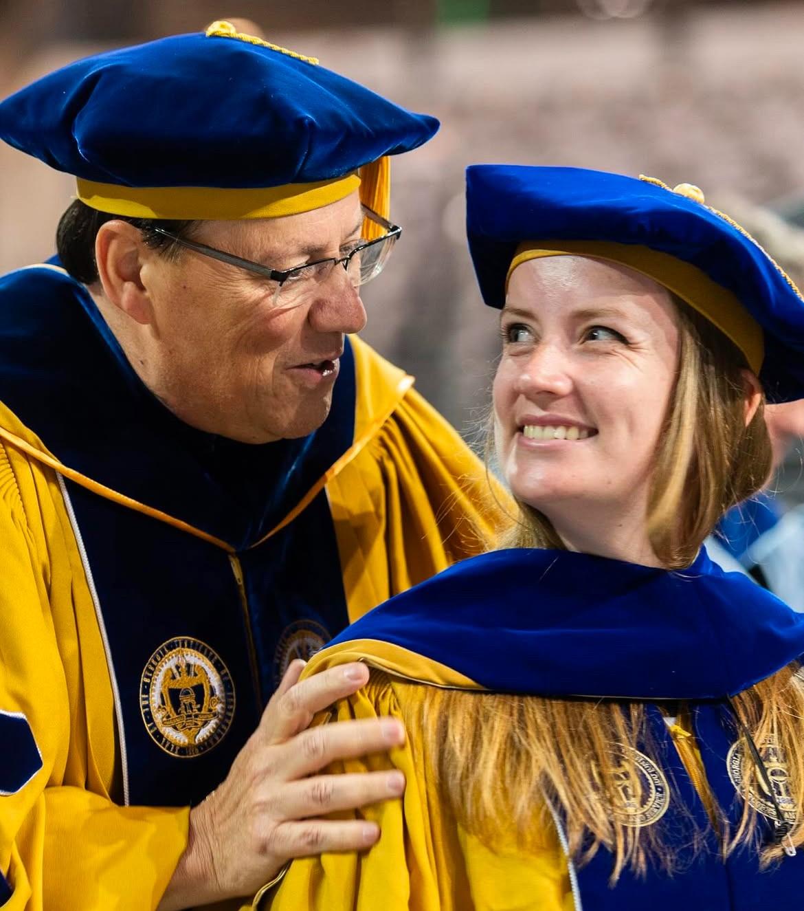 Stephanie Introne is hooded by her advisor Dr. Dimitri Mavris